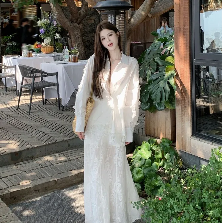时尚套装2025夏季新款设计感蕾丝拼接长袖衬衫女高腰半身裙两件套