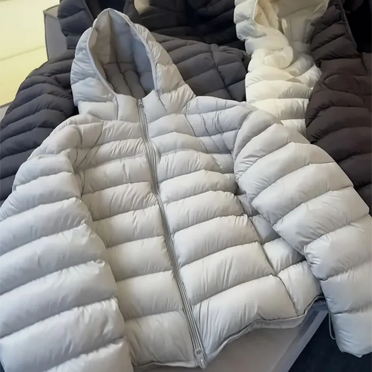 白鸭绒羽绒服女2025冬季新款韩版排骨显瘦连帽保暖通勤加厚短外套