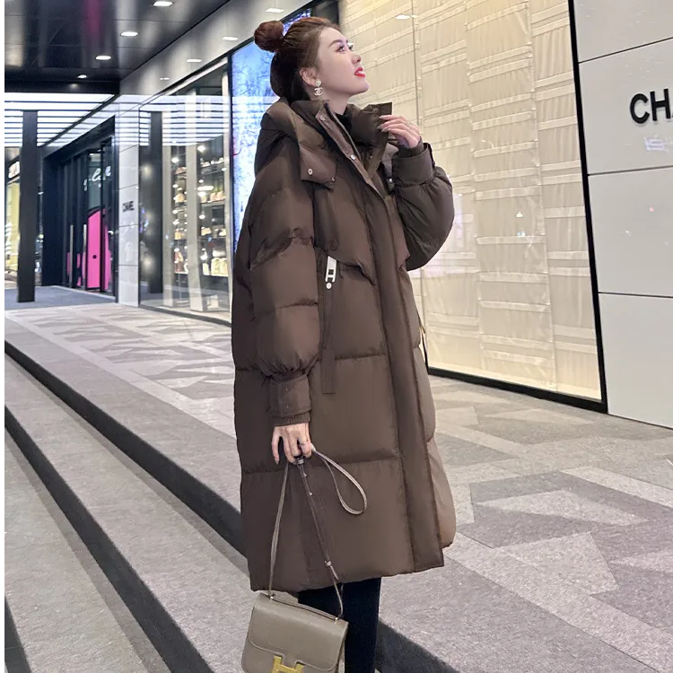 纪诗哲咖色时尚羽绒服女冬2025新款设计感保暖加厚中长款连帽外套