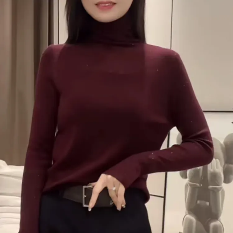 高级感轻奢风镂空拼接高领针织衫女2025秋冬新款时尚百搭打底上衣