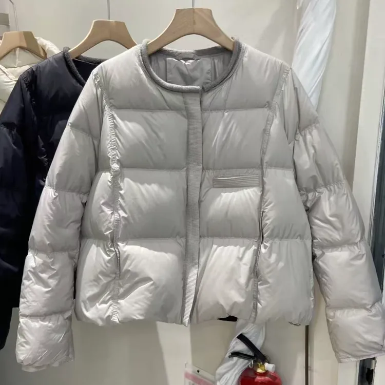 今年流行设计感白鸭绒羽绒服女装2025冬季韩系流行时尚洋气上衣