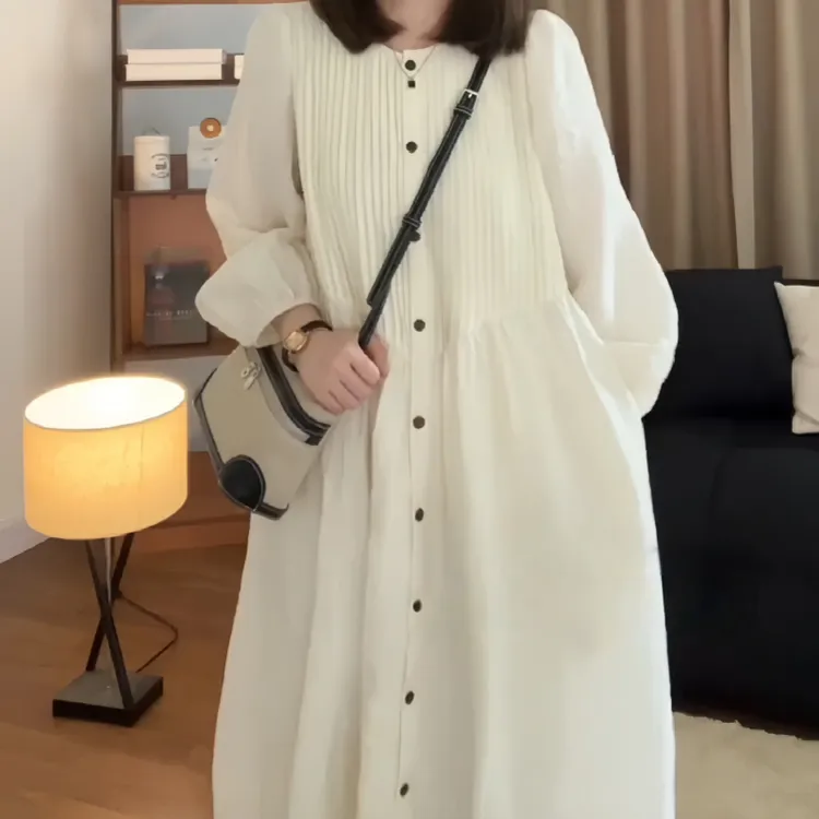法式气质连衣裙初秋女装宽松显瘦轻奢高级感单排扣压褶杏色长裙子