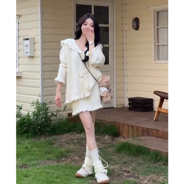 2025秋季新款时尚甜美减龄气质慵懒风针织毛衣短裙两件套