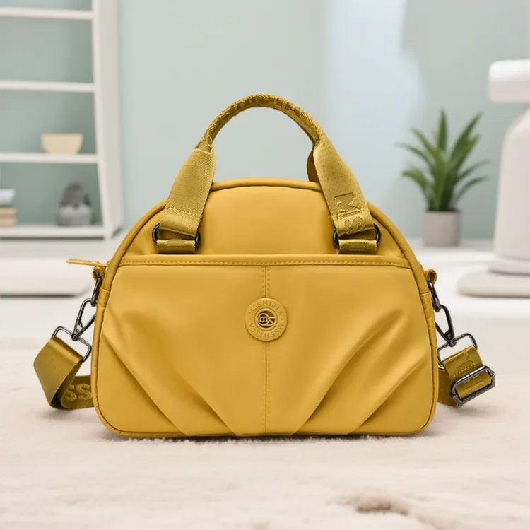 甜美风韩式斜挎包百搭单肩马蹄包轻便网红便携