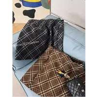 晶咕【克里斯汀】韩系毛呢格纹A字半身裙百搭格子