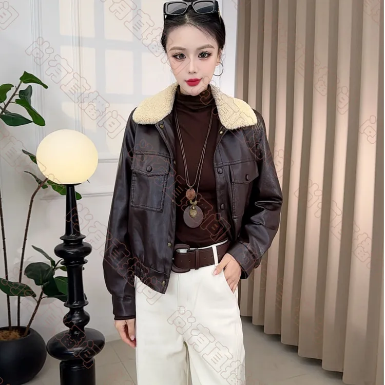 冬季新款海宁女士短款韩版修身时尚加绒加厚皮衣外套 817