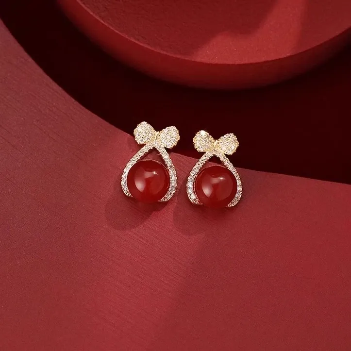 铜合金耳饰 2025爆款新年酒红色蝴蝶结珠珠耳钉新款过年耳饰耳环.