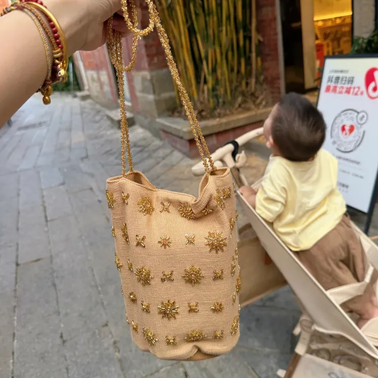 钉珠刺绣水桶包2025夏季新款牛仔布单肩斜挎包百搭新中式原创女包