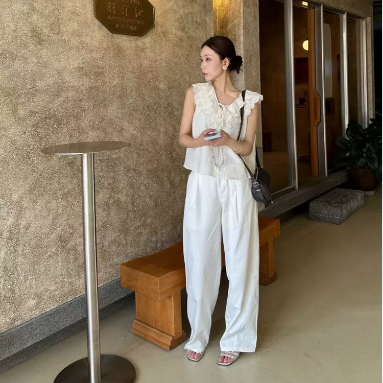 法式白色蕾丝花边无袖上衣女2025夏季新款别致小衫休闲阔腿长裤子