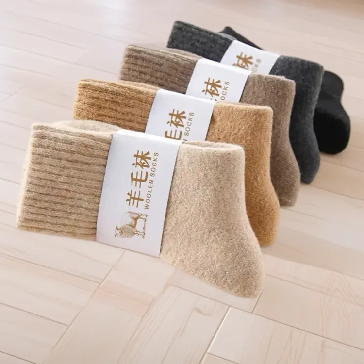 男女通用加厚加绒保暖中筒羊毛发热毛线滑雪袜适合秋冬季运动穿戴