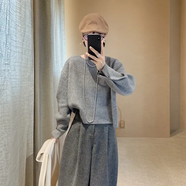 时尚气质轻熟风灰色针织衫女秋季设计感后背单排扣开衫毛衣打底衫