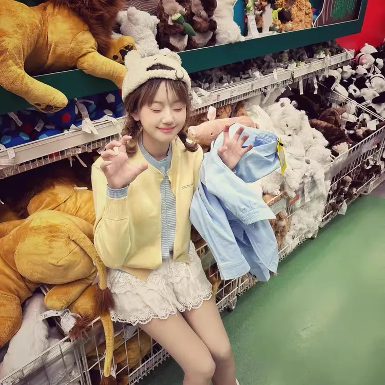 多巴胺黄色针织开衫女春季新款软糯慵懒毛衣拼接假两件上衣设计感