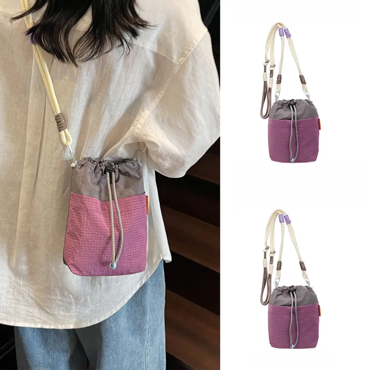 迷你小包包女2025新款高级感通勤百搭撞色水壶包单肩斜挎包