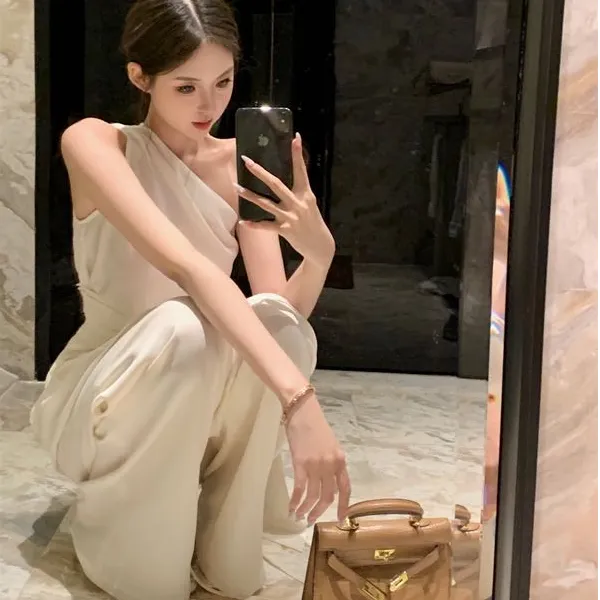 2025春季新款时尚套装性感辣妹斜肩上衣宽松直筒阔腿长裤休闲套装