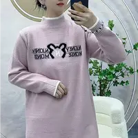 小熊头刺绣拼色长款针织毛衣