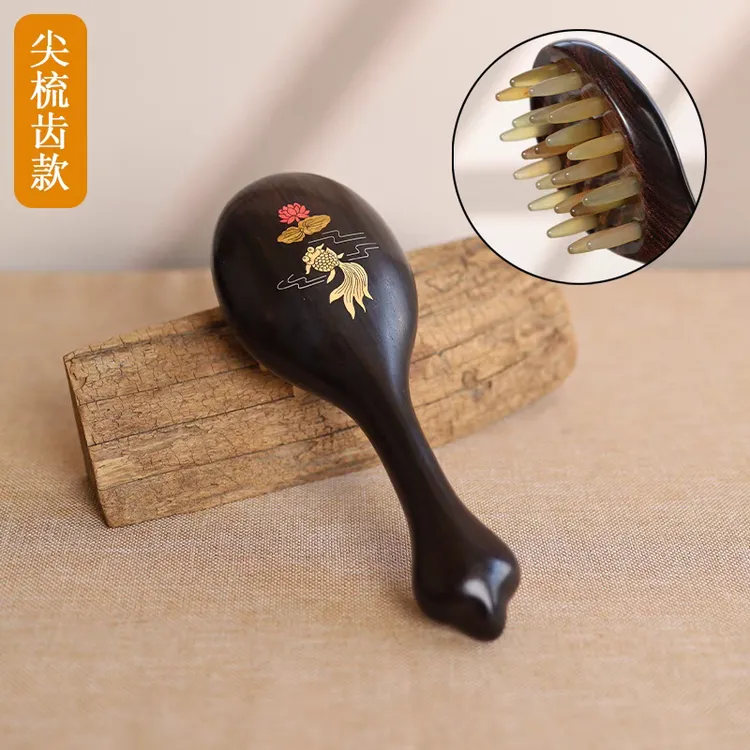 紫光檀木手柄拍拍梳头疗按摩梳羊角钉钉多工能保健梳经络梳梳子