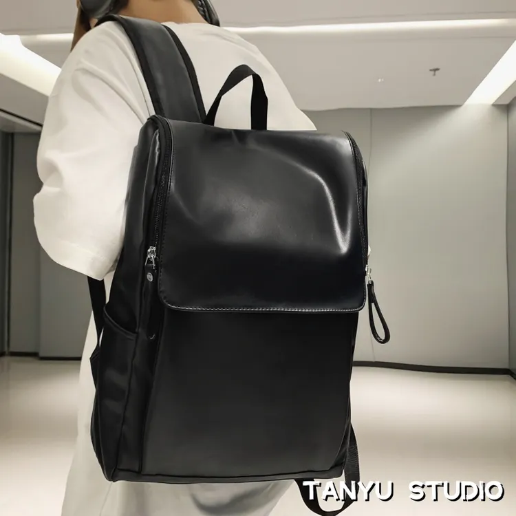 探屿潮牌皮质双肩包男大容量英伦PU电脑包大学生背包韩版休闲书包