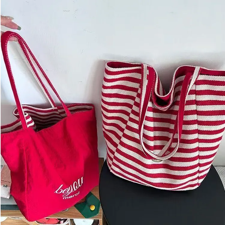 2025夏季新款横纹双面可用帆布包防泼水单肩斜挎包妈咪包韩版简约