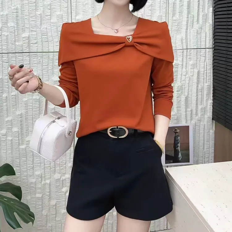 小施家气质女人味别致领显瘦上衣69032