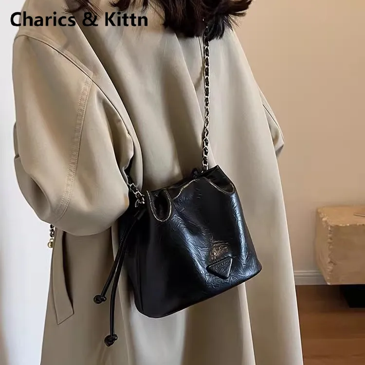 Charics&Kittn水桶包小包女式2025新款斜挎包真皮高级感链条女包