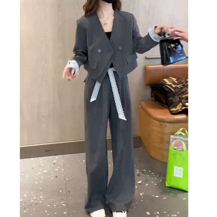 春季新款时尚套装女2025洋气显瘦不规则上衣阔腿裤两件套潮