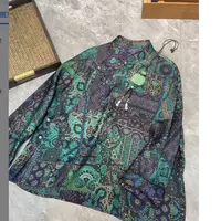 谢美丽-精选双面紫调绿色珠扣上衣新中式
