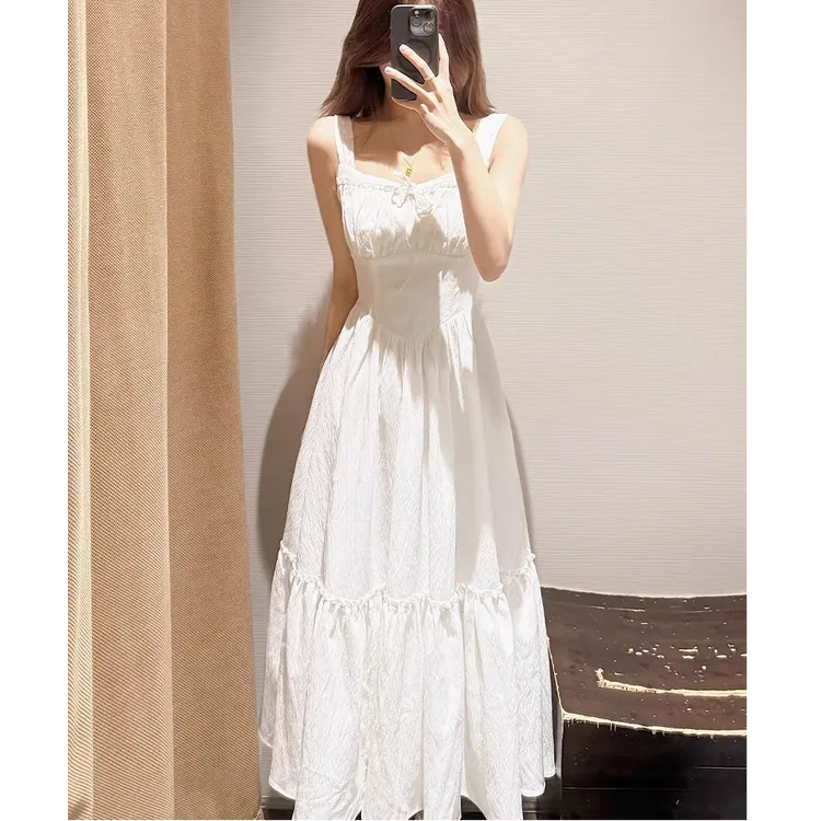 F1029法式初恋甜美白色吊带连衣裙夏季2025新款海边度假收腰长裙