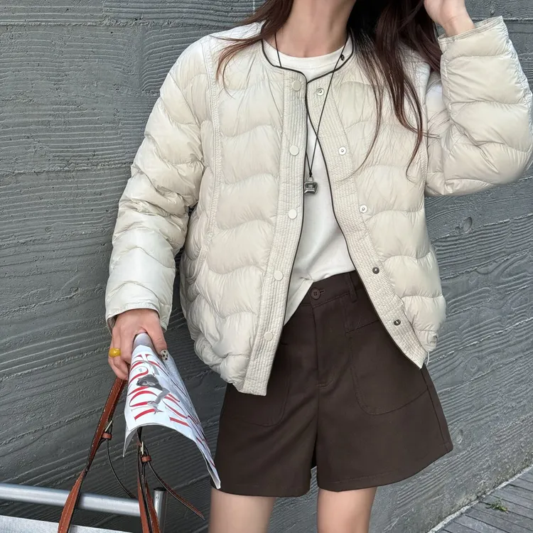 2025新款新国标90绒圆领韩版通勤羽绒服女百搭秋冬外套保暖时尚18