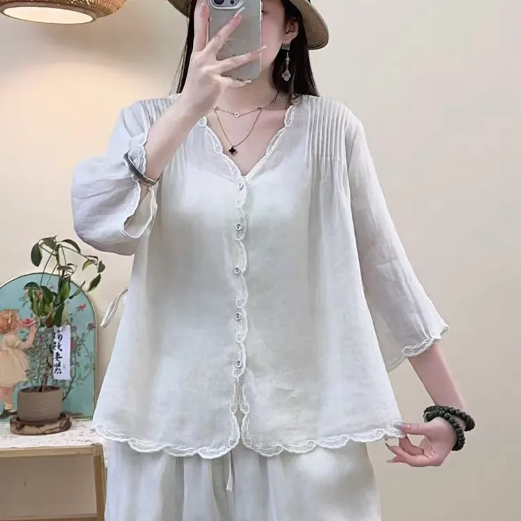 (衣兮文艺花边苎麻小衫)8679夏季清透感时尚气质单排扣开衫上衣W