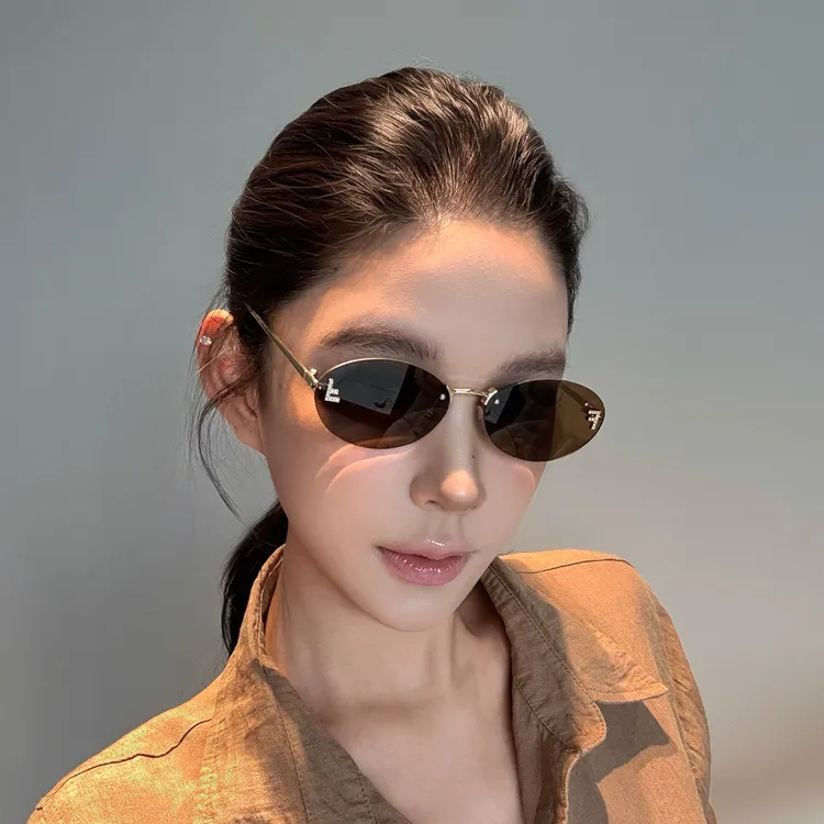 弗瑞姆眼镜椭圆镶钻太阳镜女ins无框F太阳时尚显脸小网红墨镜141