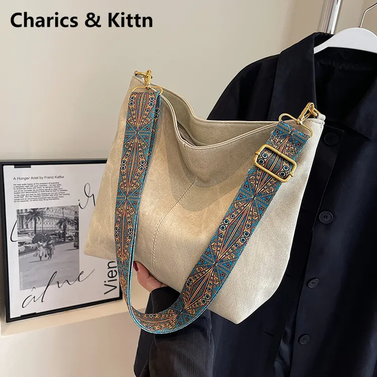 Charics&Kittn秋冬包包女款2025新款小众单肩真皮通勤斜挎水桶包