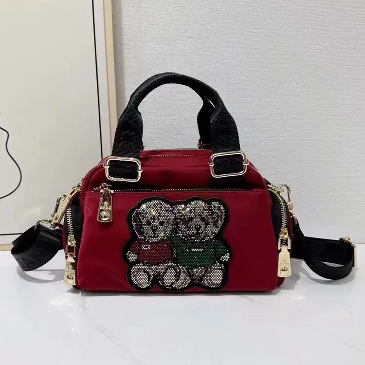 正品欧菲亚丹时尚百搭防泼水包包轻便大容量多隔层女士手提斜挎包