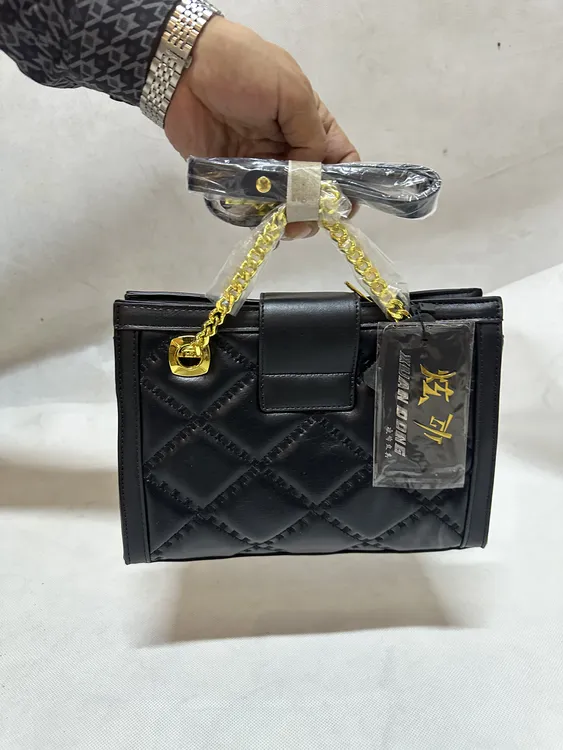 新疆包邮时尚百搭女士真皮小众水桶包单肩手拿包轻奢休闲复古简约