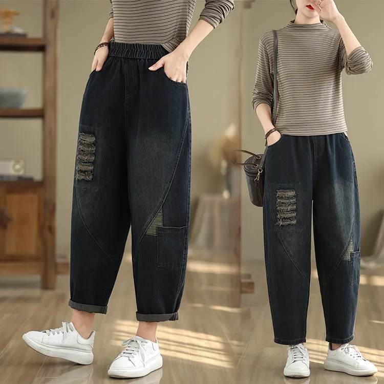 秋季新款时尚简约破洞牛仔哈伦裤女大码松紧腰显瘦百搭九分阔腿裤