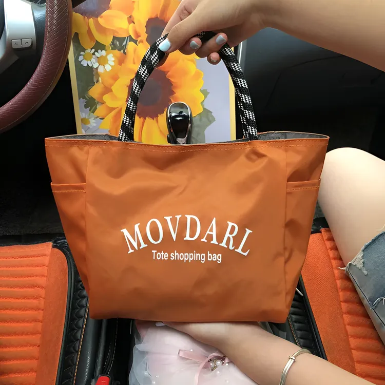 购物手提包2025年日常逛街通勤简约防水便当包俩面可用饭盒包006