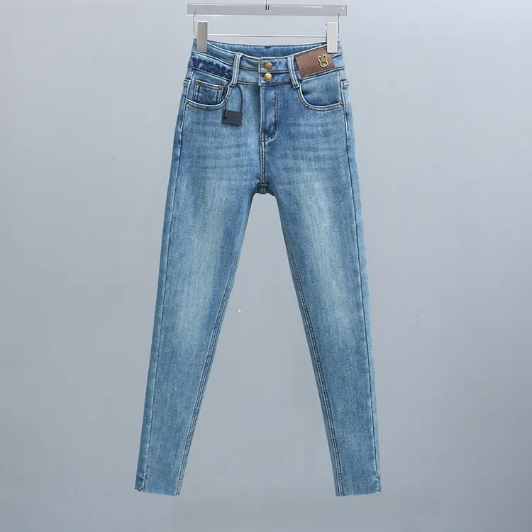 冬季加绒加厚高腰小脚裤2025年新款时尚浅蓝色牛仔裤毛边女铅笔裤