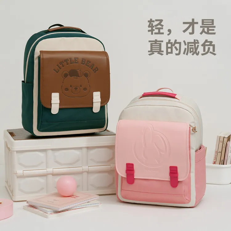 小学生减负书包女孩一二三到六年级儿童双肩包学院时尚轻便男新款