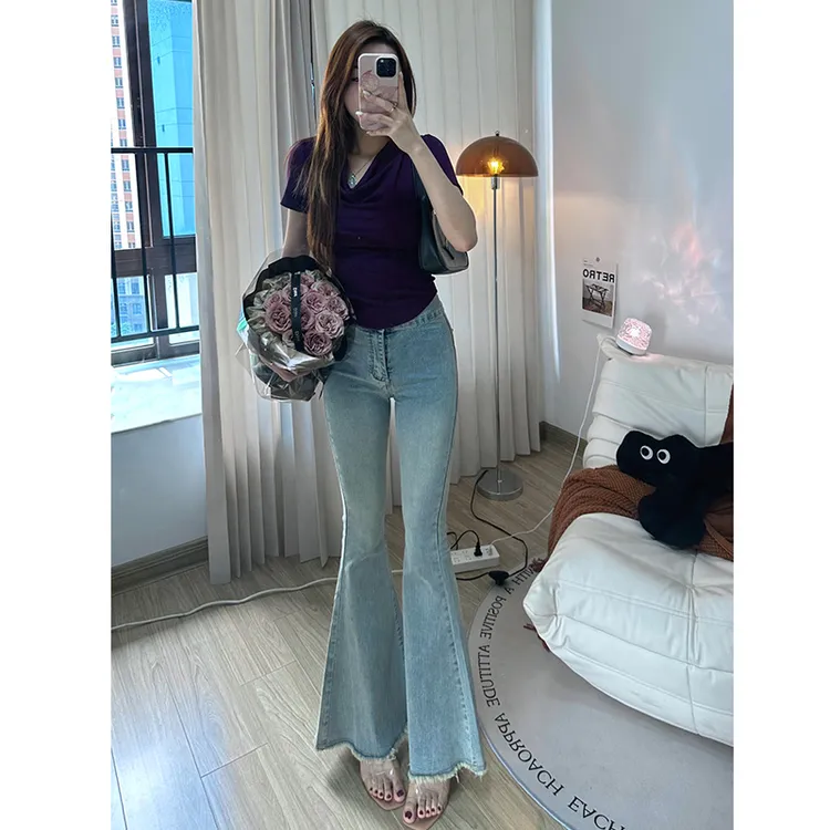 浅蓝色毛边微喇牛仔裤女2025秋季新款百搭显瘦显高鱼尾喇叭长裤