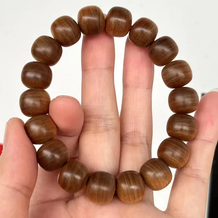 印度老山檀香手串精品横纹.虎皮纹.老型珠规格：11mmx12mmx18颗粒