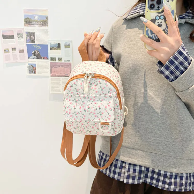 小碎花帆布背包女2025新款韩系小清新潮流条绒休闲包迷你双肩背包