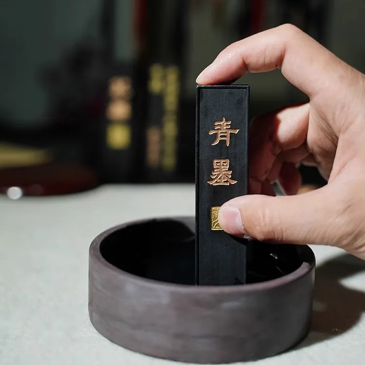 一得阁油烟墨块一两文房四宝漆烟墨锭二两手工磨墨汁研墨砚台专用