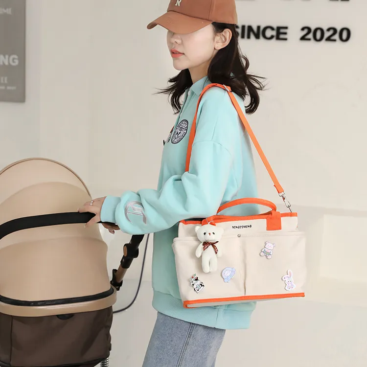 多功能妈咪包斜跨母婴包便携轻便妈妈包休闲日系斜挎包简约百搭