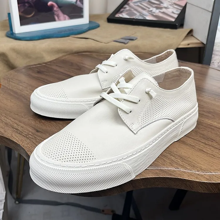 新款时尚真皮小白鞋基础款百搭休闲鞋冲孔透气板鞋潮流平底男鞋