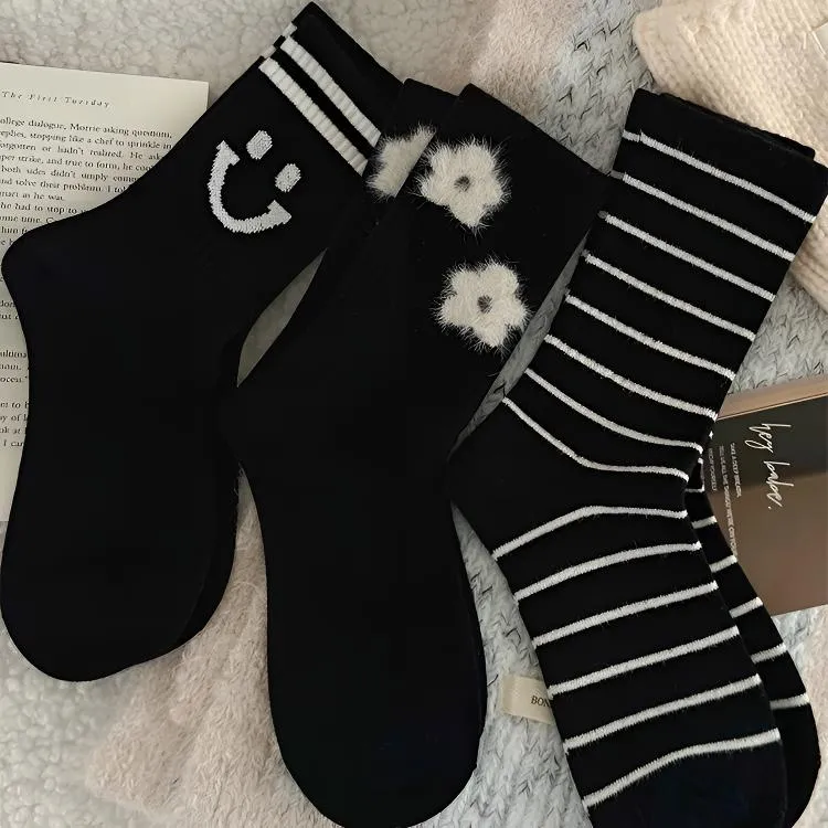 黑色羊绒厚袜子女中筒袜秋冬季保暖甜美小花ins潮网红款条纹长袜
