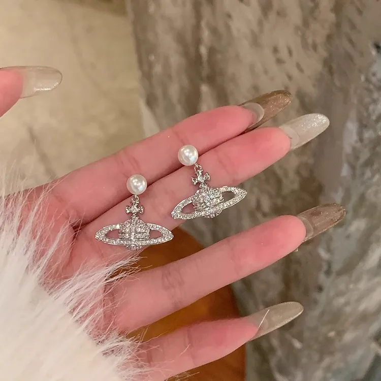 铜合金耳饰 微镶锆石土星珠珠耳环女高级感时尚设计精致轻奢耳饰 