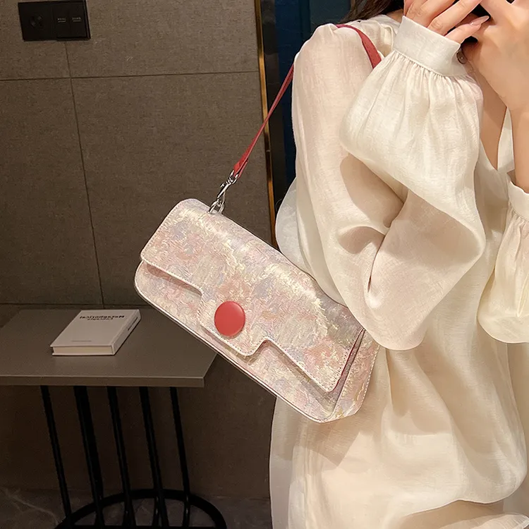 便携包包女款爆款2025新款百搭气质单肩包上班轻奢通勤腋下法棍包