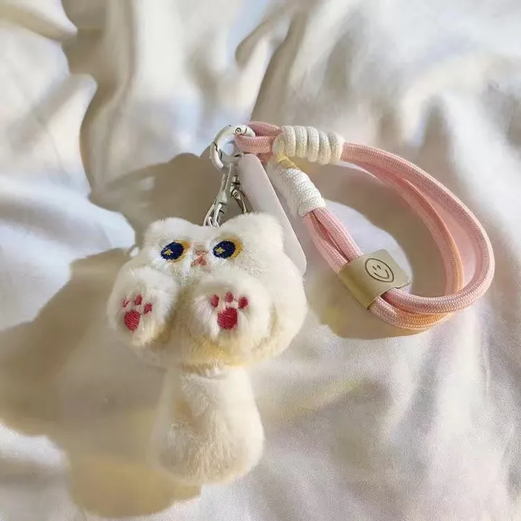 短绳ins白色毛绒猫尾巴手机壳挂件旋转包包钥匙扣挂饰品女款通用