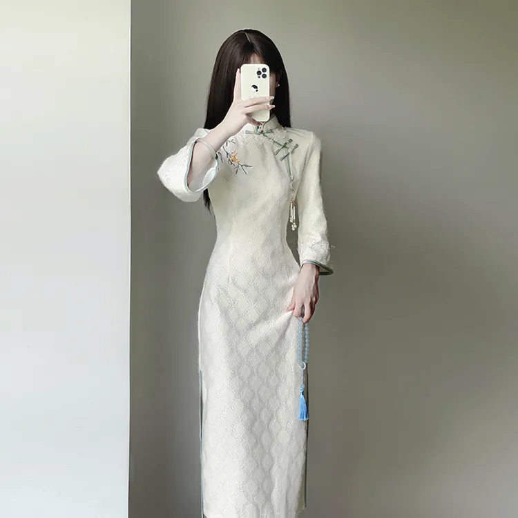 白色旗袍新款2025新款秋冬季洋装新中式少女年轻款高端气质连衣裙