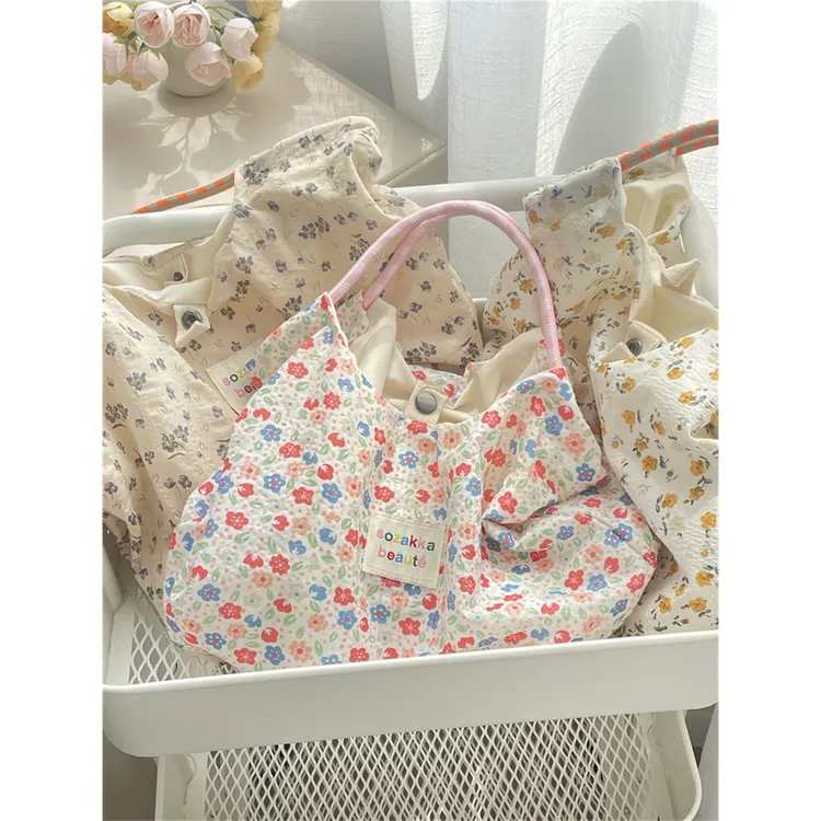 韩国碎花帆布包包女夏新款大容量手提包薄款手提度假沙滩包