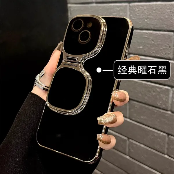 适用苹果16promax手机壳iPhone15创意时尚14隐形镜头支架13保护壳